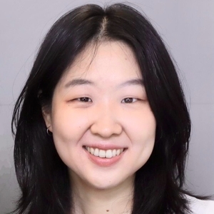 Headshot of Yoonmin against a blank background.