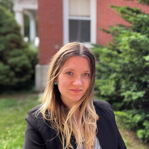Ania's headshot taken outdoors.