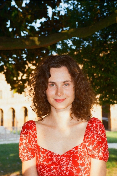 Arina's headshot.