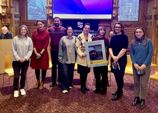 Students and Panelists meet to discuss the book.